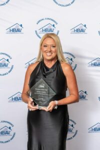 Alisha Smith pictured holding her award.